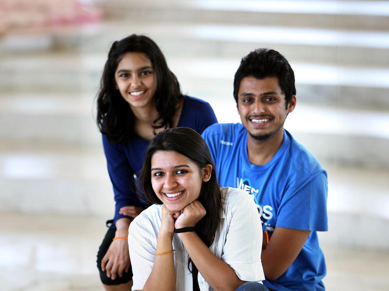youth participants of a yoga meditation program smiling