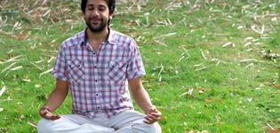 Meditation-Young-man-meditating-on-a-lawn.jpg