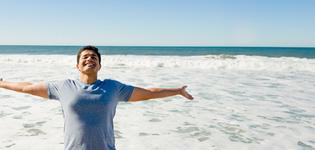 happiness - guy open arms - beach2